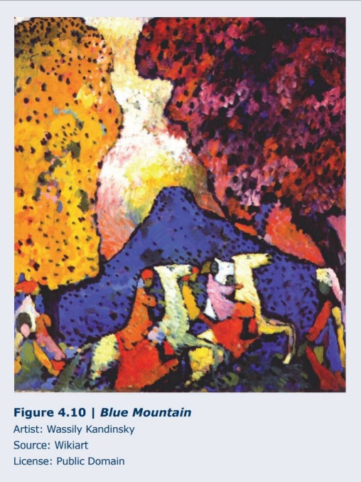 Kandinsky paints a blue mountain with horses in the foreground. Yellow and red trees are large in the background. 