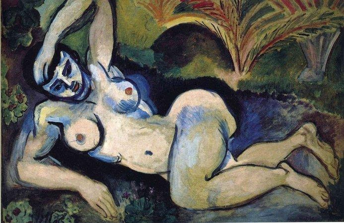 A nude woman lying on her side with her hand in her hair. 