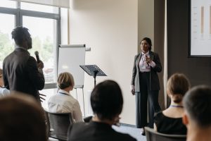 person asking a question during presentation