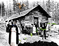 Clark Iverson dressed as St. Thomas Aquinas stands in front of a one room school in Eatonville, Washington. 