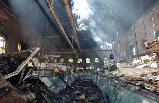 Interior of Eastern Market post fire 2007. Debris covers from floor to ceiling.