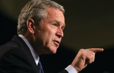 An image of George W. Bush in profile, pointing his finger to the right.