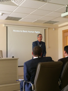 Marwan Tarazi giving a presentation about Access to Basic Human Rights