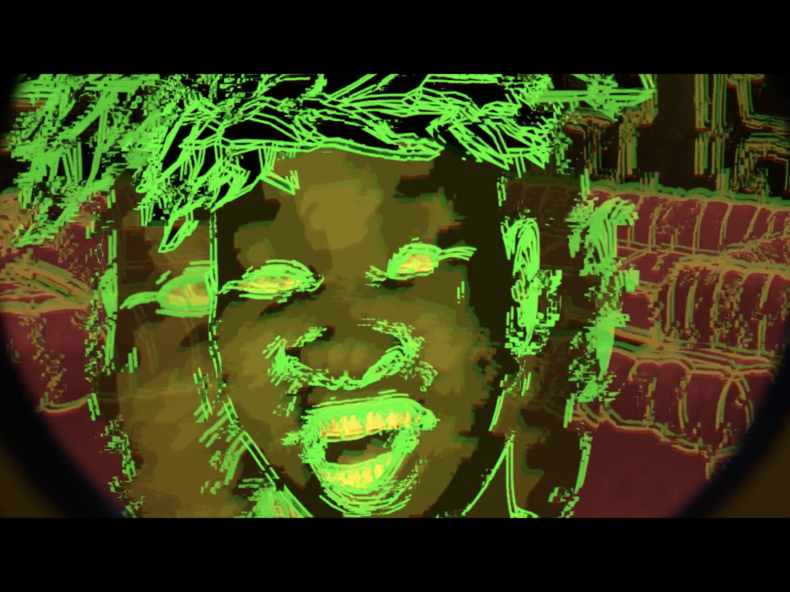 The room is completely black, and an angry girl is completely outlined in a harsh green.