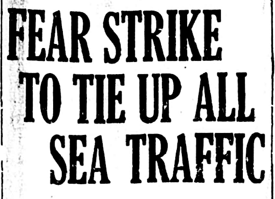 Newspaper headline reads "Fear Strike to Tie Up All Sea Traffic"