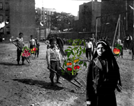 Freed slave and educator Susie King Taylor in a New York city tenement playground. Fresh vegetables are next to children.