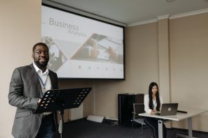 man speaking at conference
