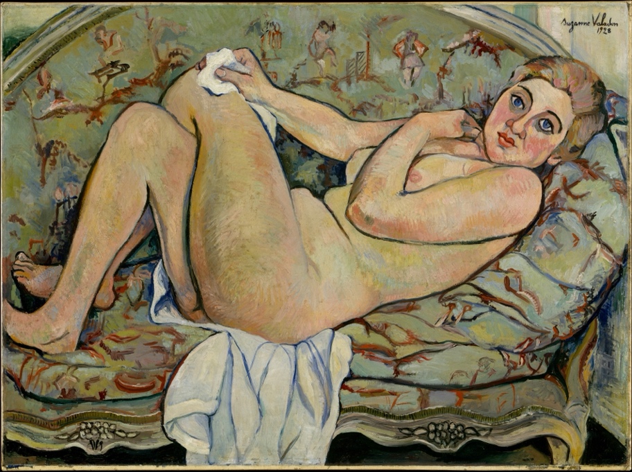 A person lying on a couch

Description automatically generated