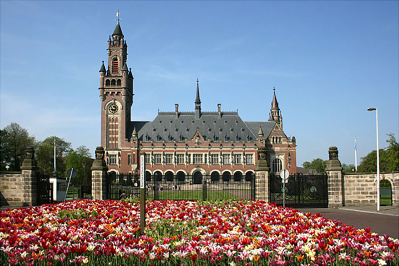A large building with a clock tower

Description automatically generated with medium confidence