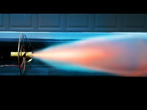 Thumbnail for the embedded element "Model Rocket Engine In A Vacuum Chamber - 4K Slow Motion - will it burn? - Rockets (S1 • E3)"