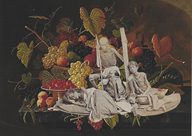 Emaciated victims of the Orissa famine sit against a bountiful fruit platter. 