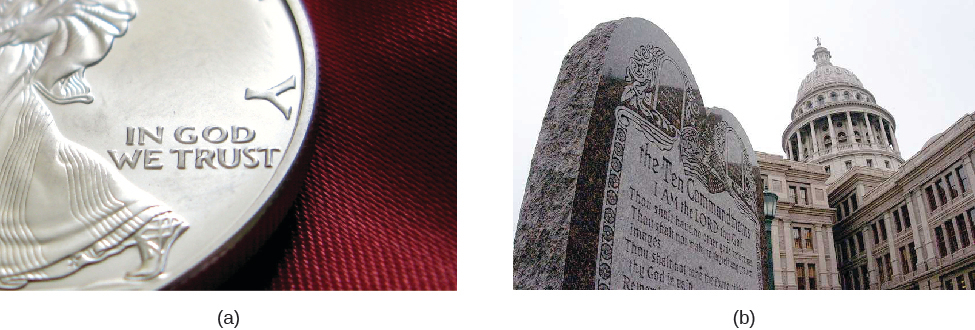 Photo A is of a close up of an U.S. coin. The words “In God we trust” can be seen on the coin. Photo B is of a sculpture that lists the Ten Commandments. There is a building with a dome in the background.