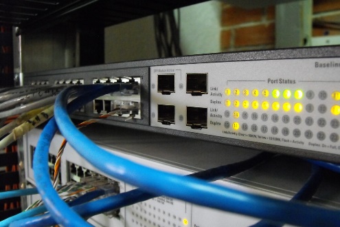 photo backend of a server with ethernet switch