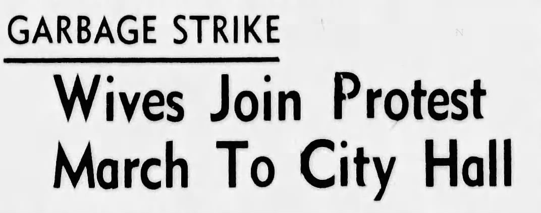 Headline reading "Wives Join March to City Hall"