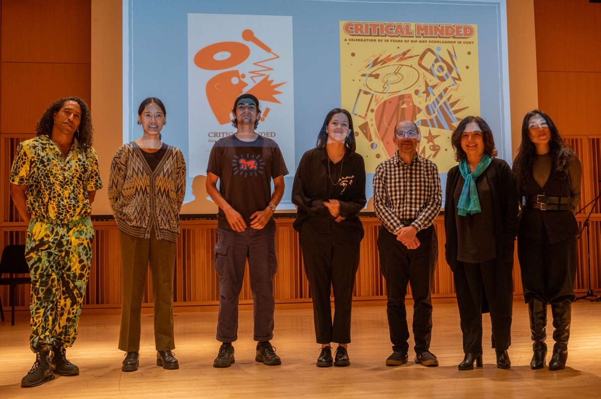 A group of people standing on a stage

AI-generated content may be incorrect.