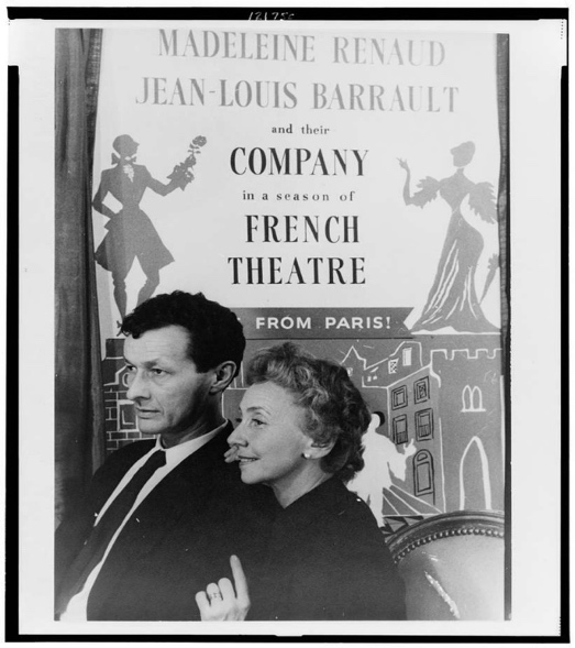 Theater goers in front a poster announcing the French  premiere of Strindberg's The Ghost Sonata, 