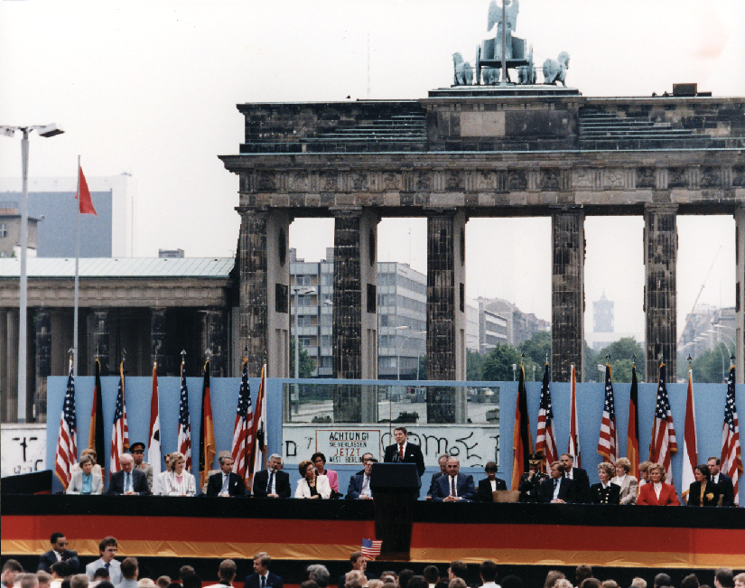 A photo of Ronald Reagan giving a speech in Berlin.