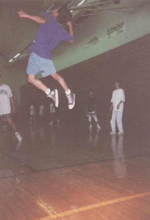 Steven is shown when he wa a student at Binghamton College, playing volleyball and leaping in the air so high it's amazing! 