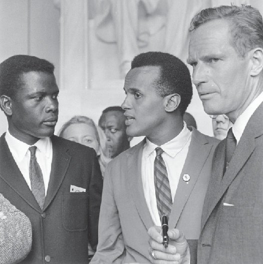 A photo of three civil rights activists, from left to right, Sidney Poitier, Harry Belafonte, and Charlton Heston.